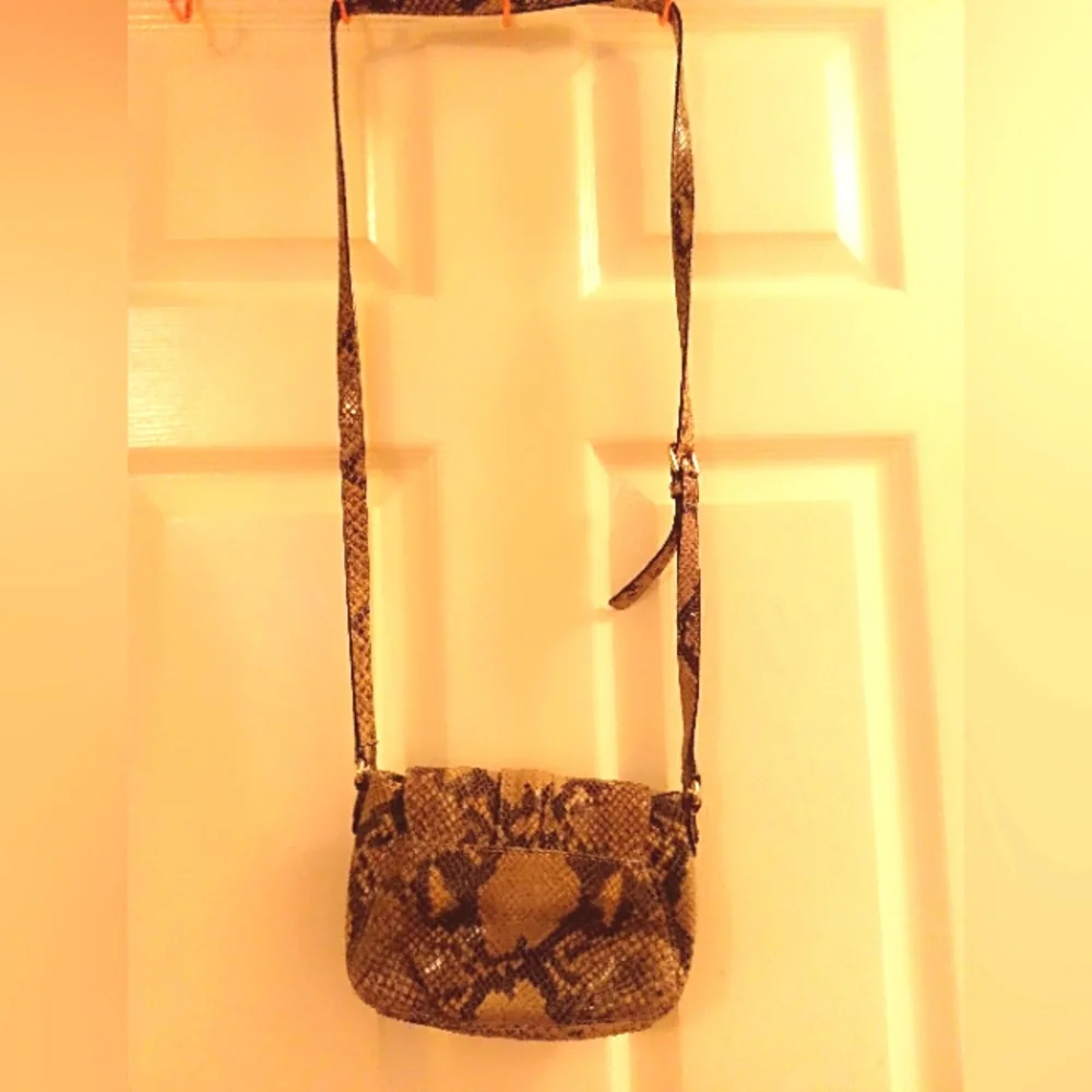 Micheal Kors tan and black small faux snake skin crossbody